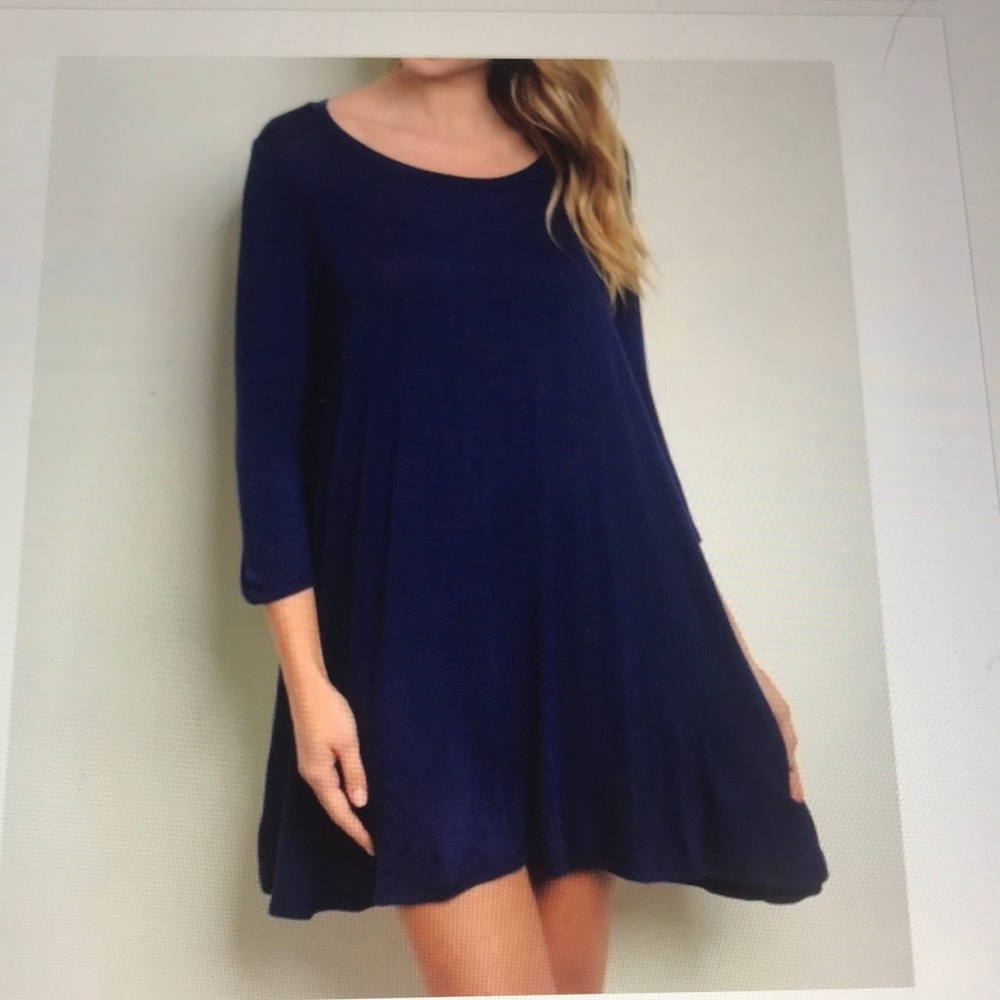 Boutique: Navy blue tunic top.